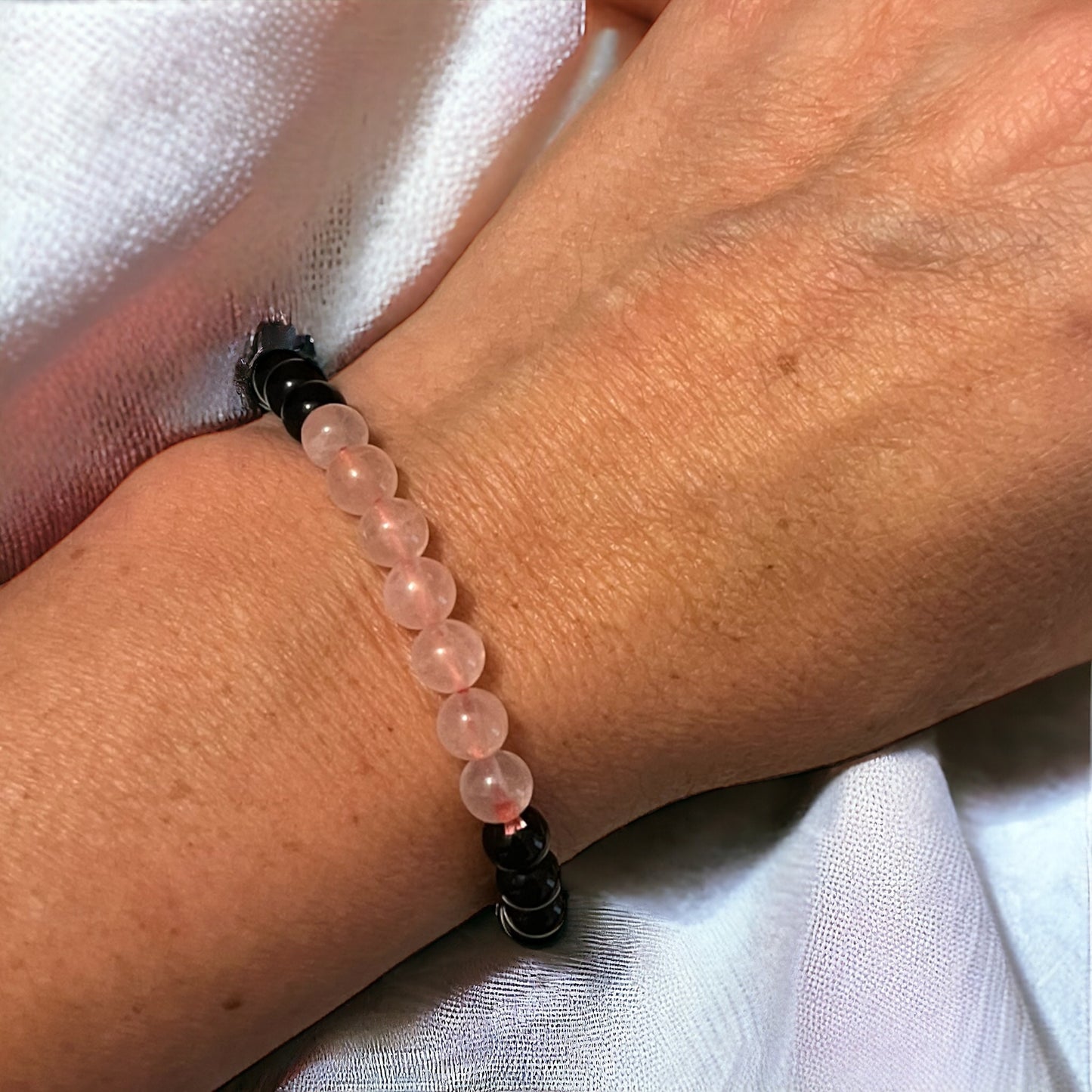 Pulsera bolita obsidiana y cuarzo rosa 6mm