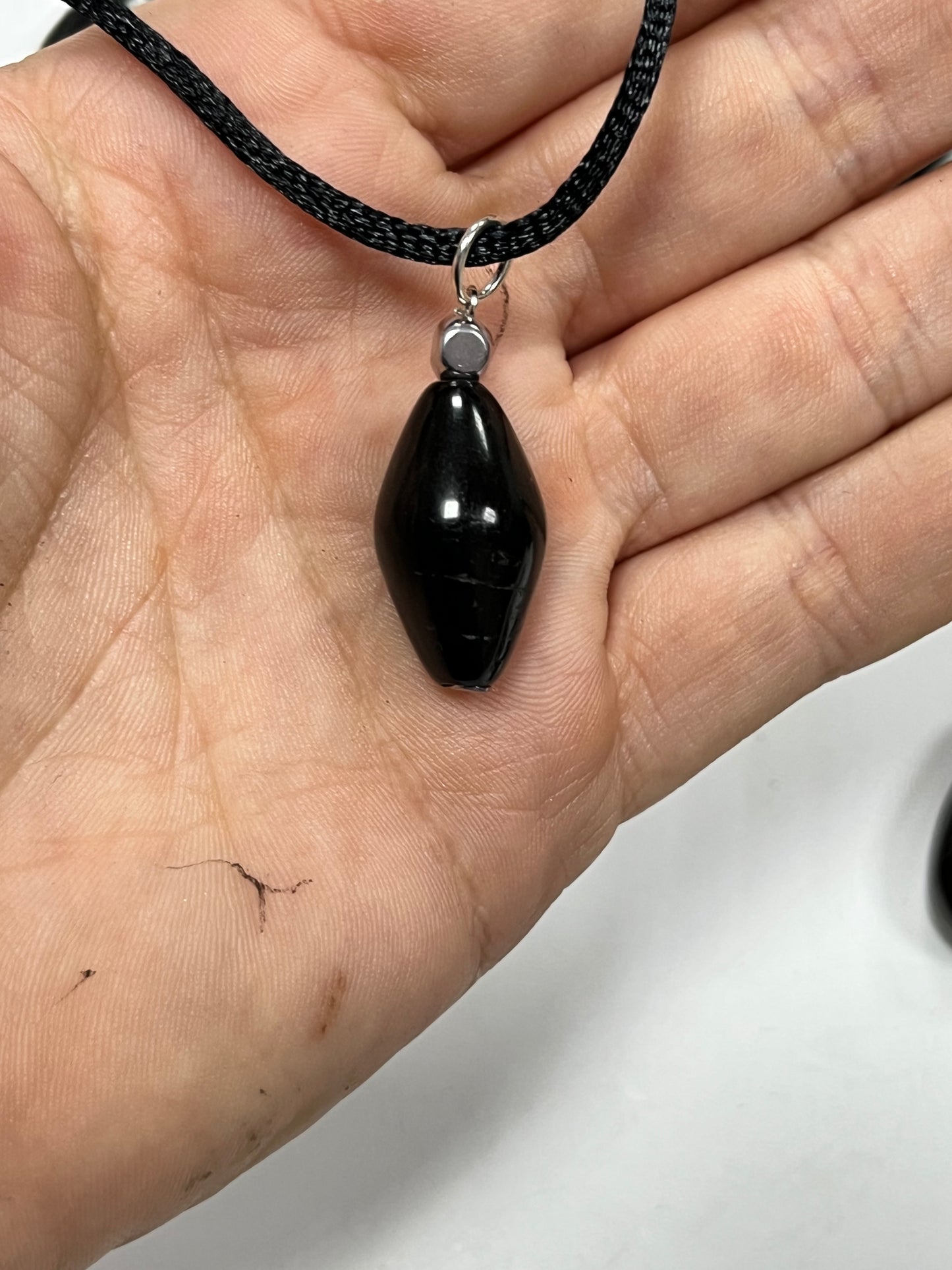 Colgante semilla de azabache