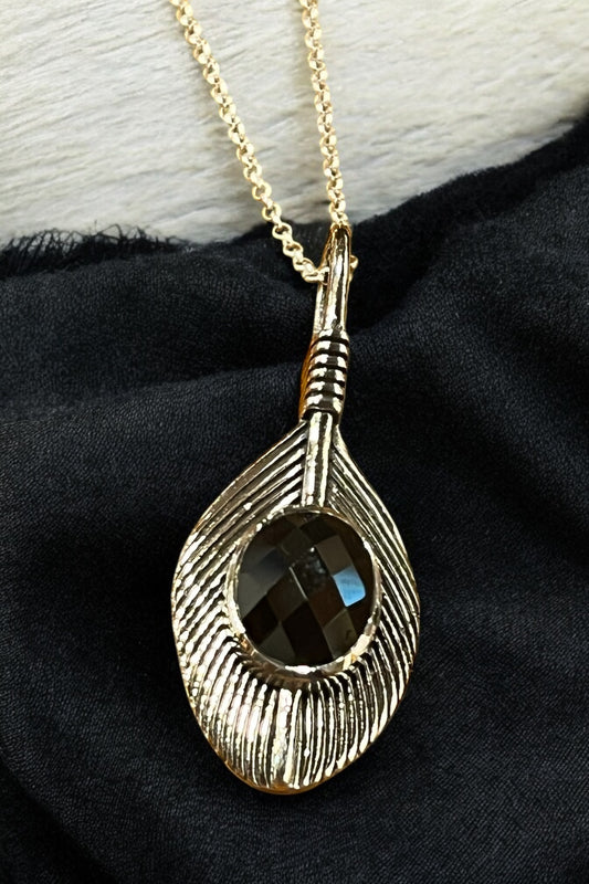 Colgante de ónix negro facetado en plata de ley