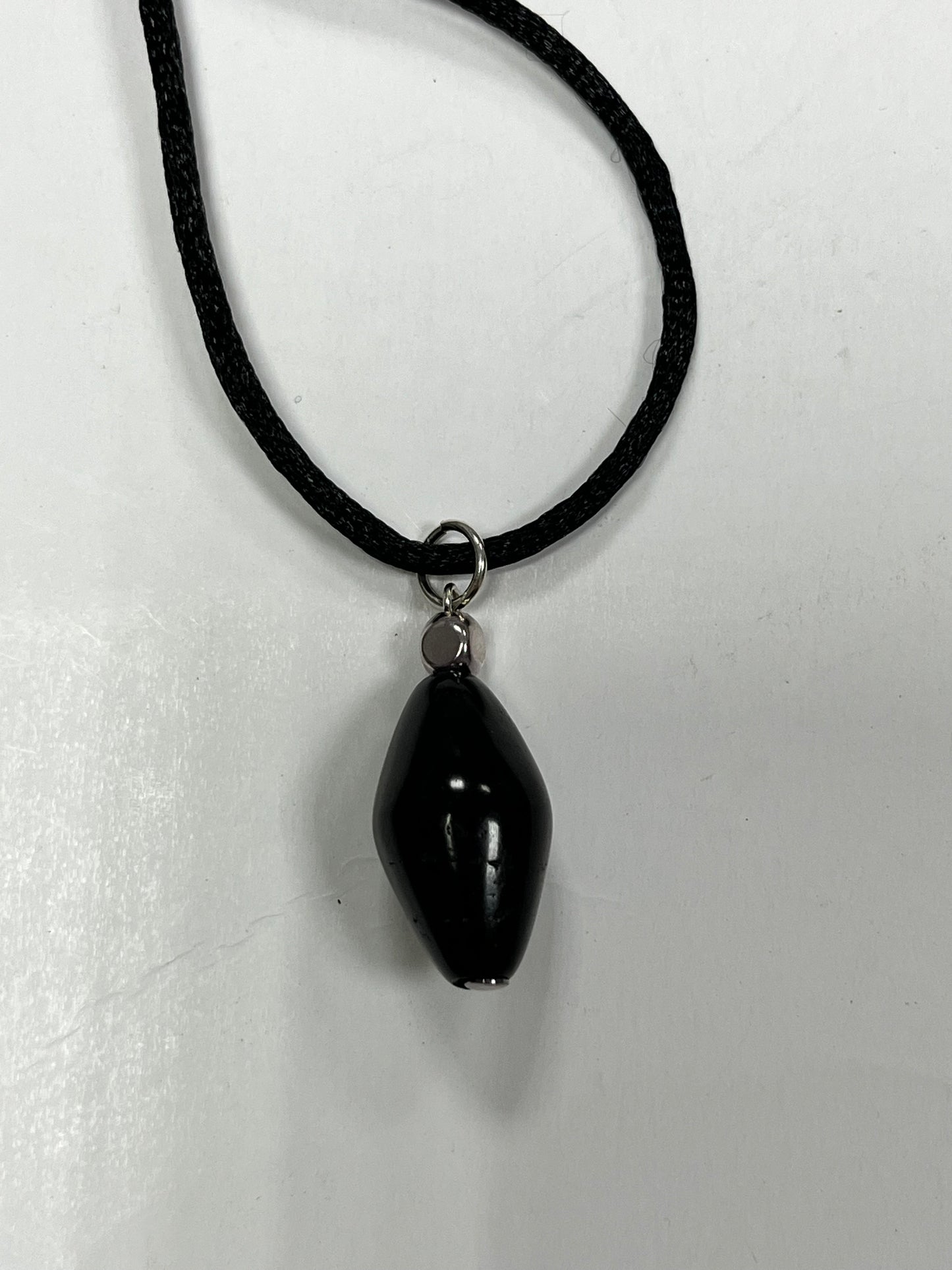 Colgante semilla de azabache