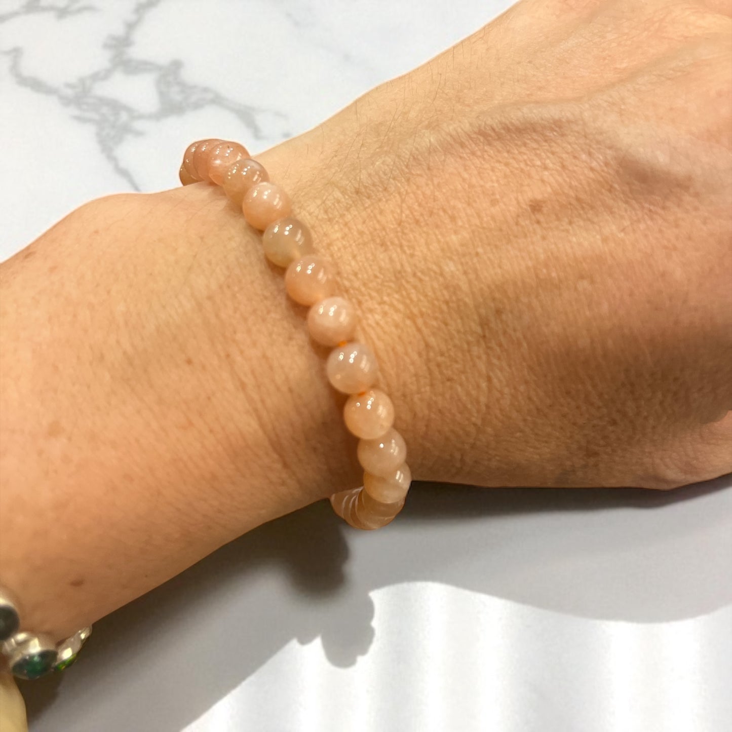 Pulsera bolitas piedra sol