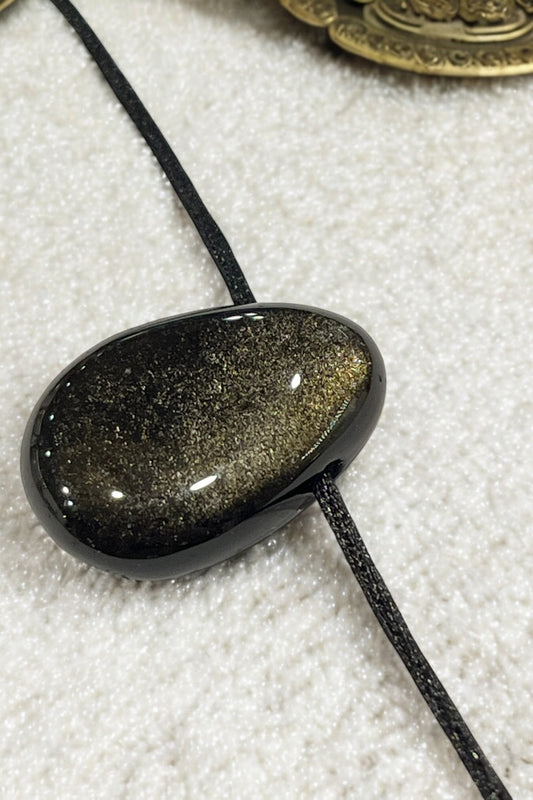 Colgante perita obsidiana dorada