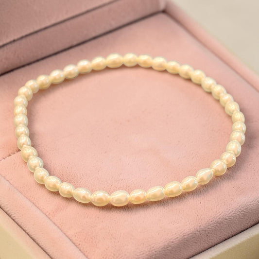 Pulsera de perlas de río naturales cultivadas “granito de arroz”