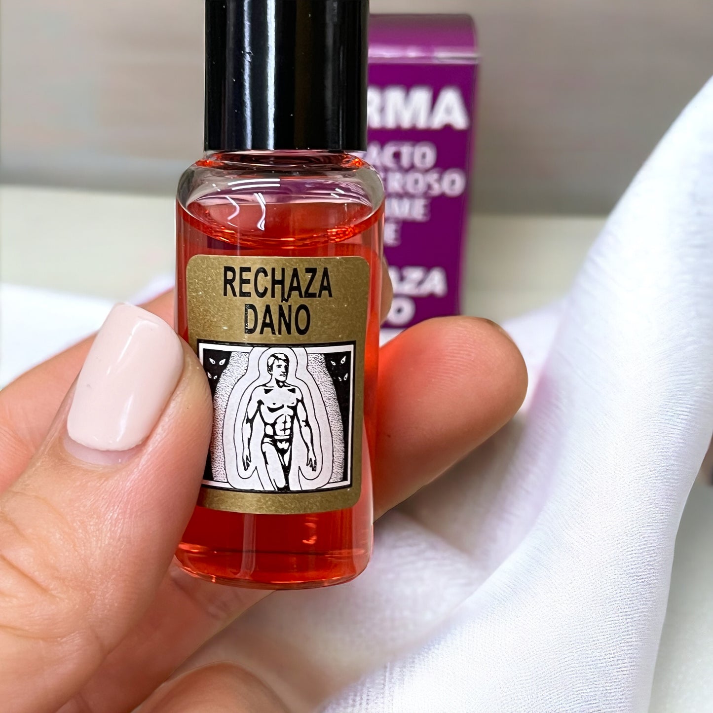 Perfume ASHE rechaza daño