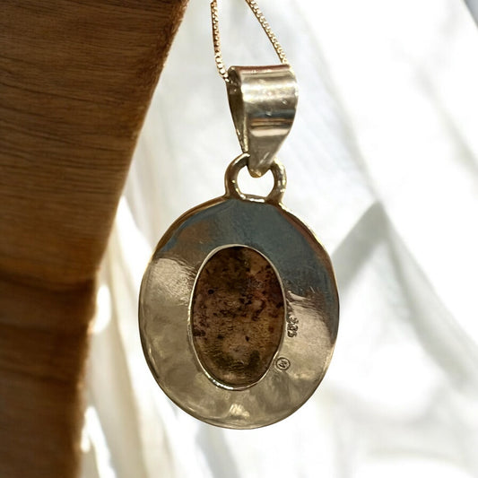 Colgante de ópalo de fuego facetado en plata de ley