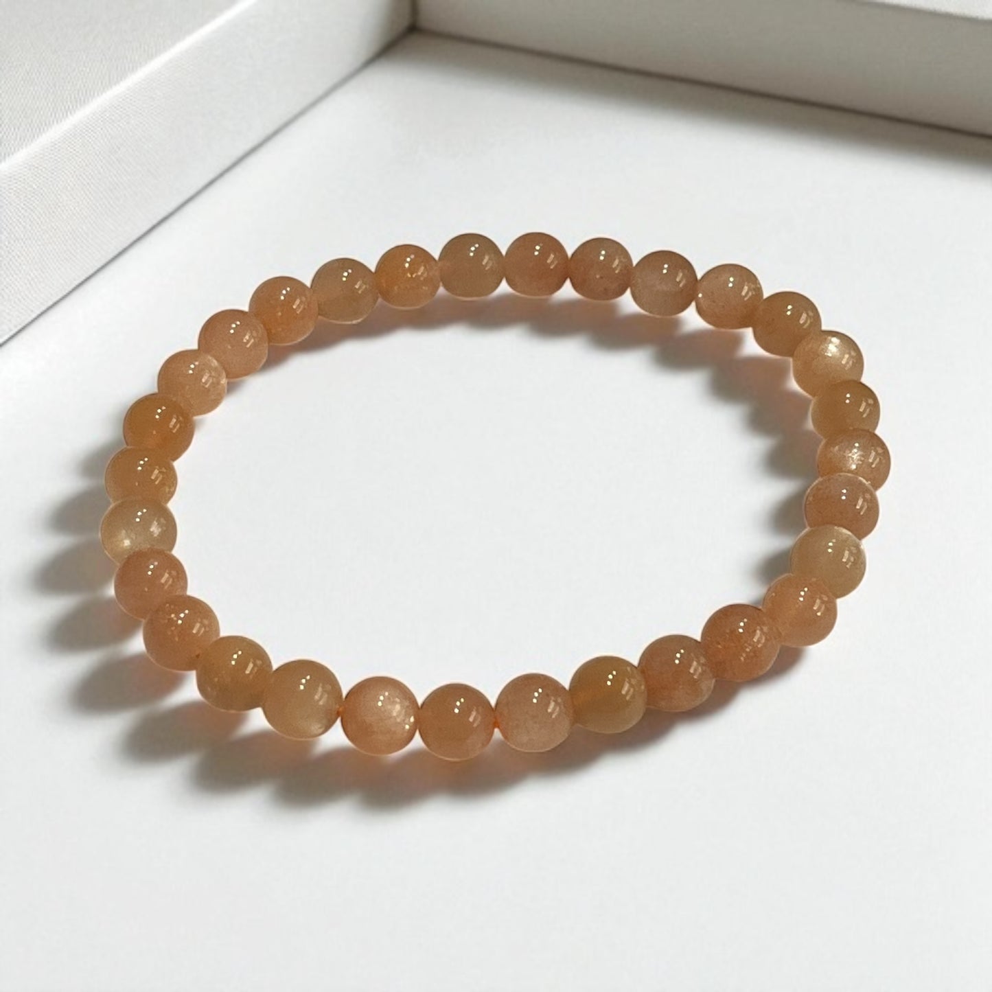 Pulsera bolitas piedra sol