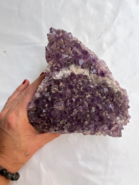 Drusa de amatista con calcita