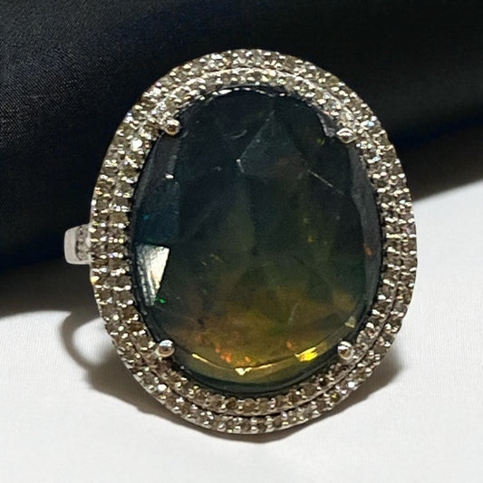 Anillo Art Déco con ópalo negro y doble orla de diamantes