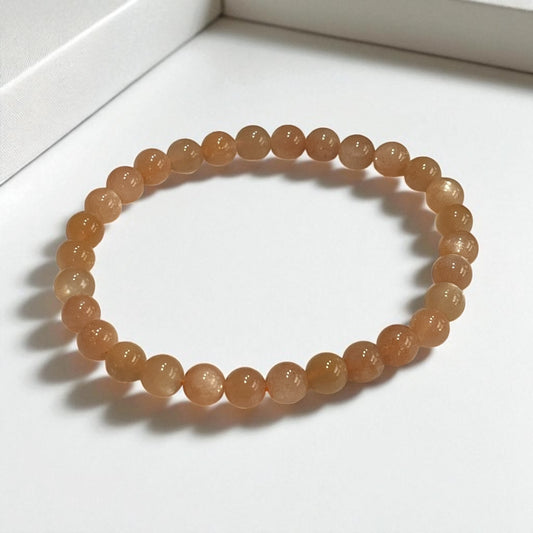 Pulsera bolitas piedra sol